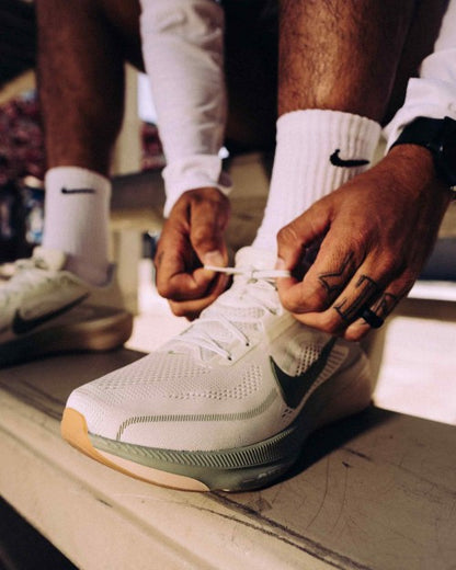 NK. Air Zoom Pegasus 42 Spruce Aura Pale Ivory Sanddrift