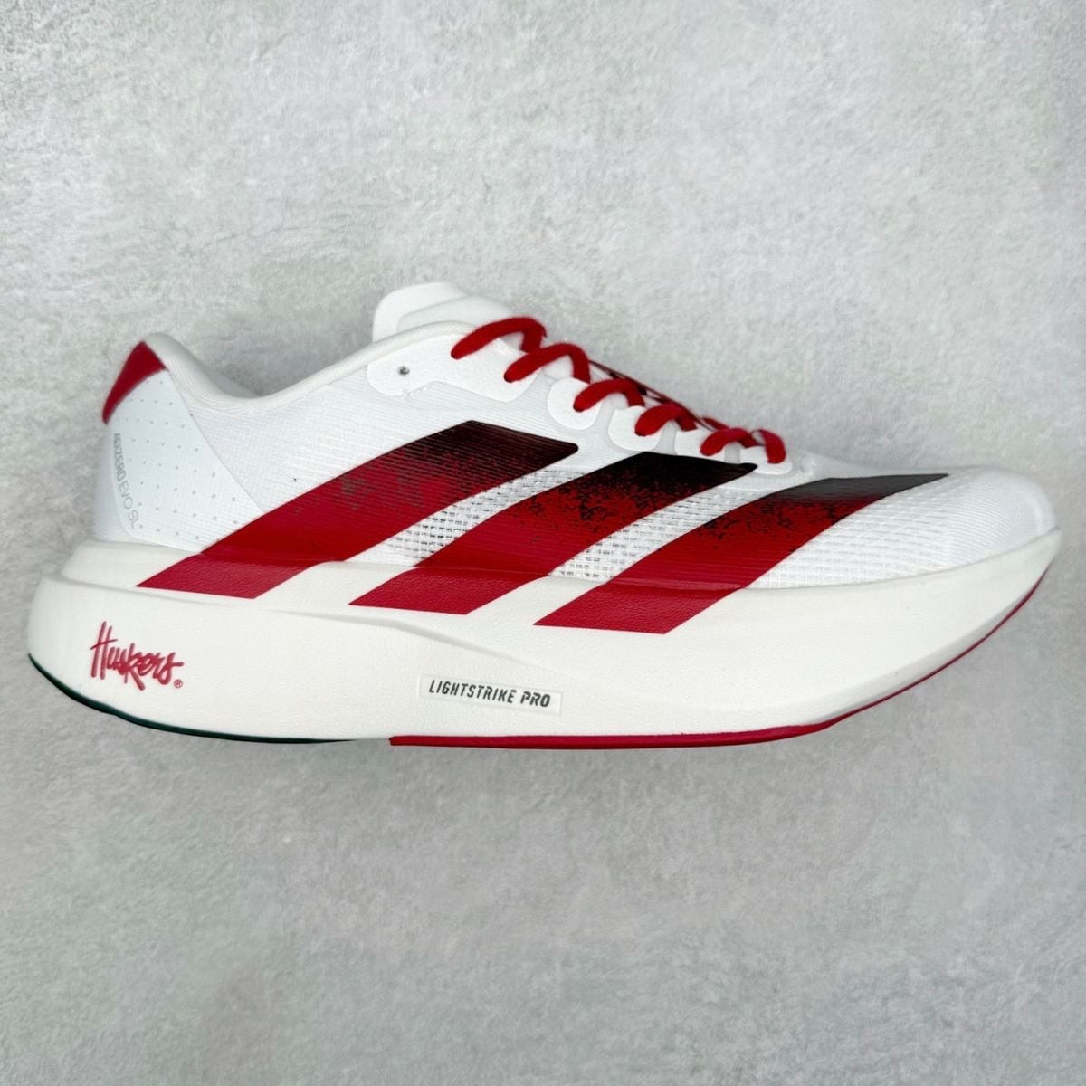 ADS. Adizero EVO SL Nebraska Cornhuskers